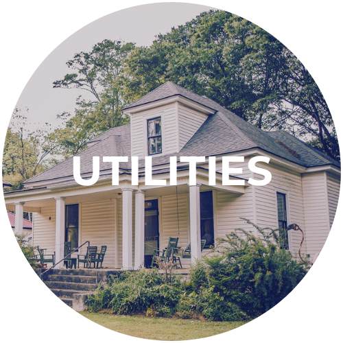 A white house with the word utilities on it