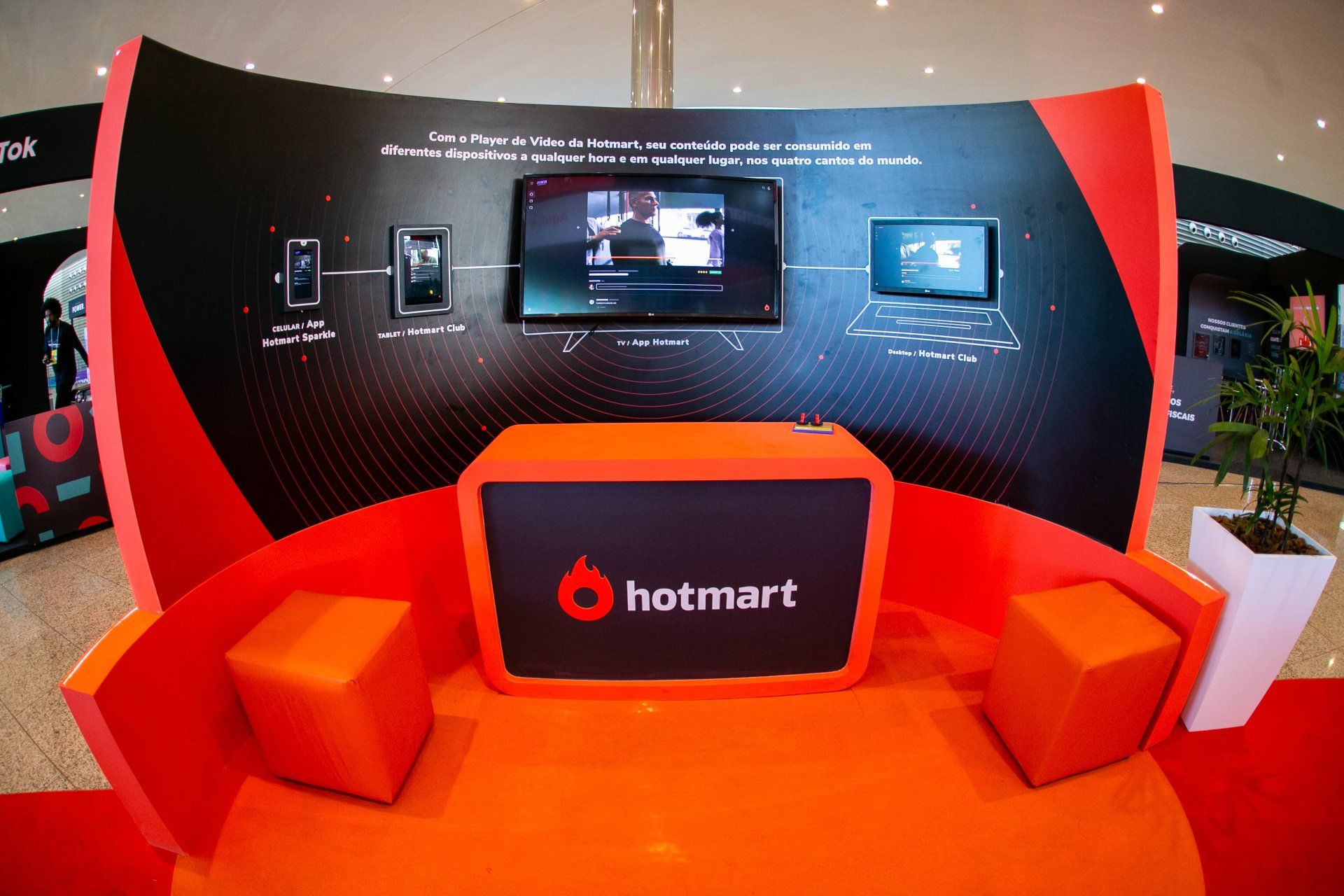 A hotmart booth with a table and chairs