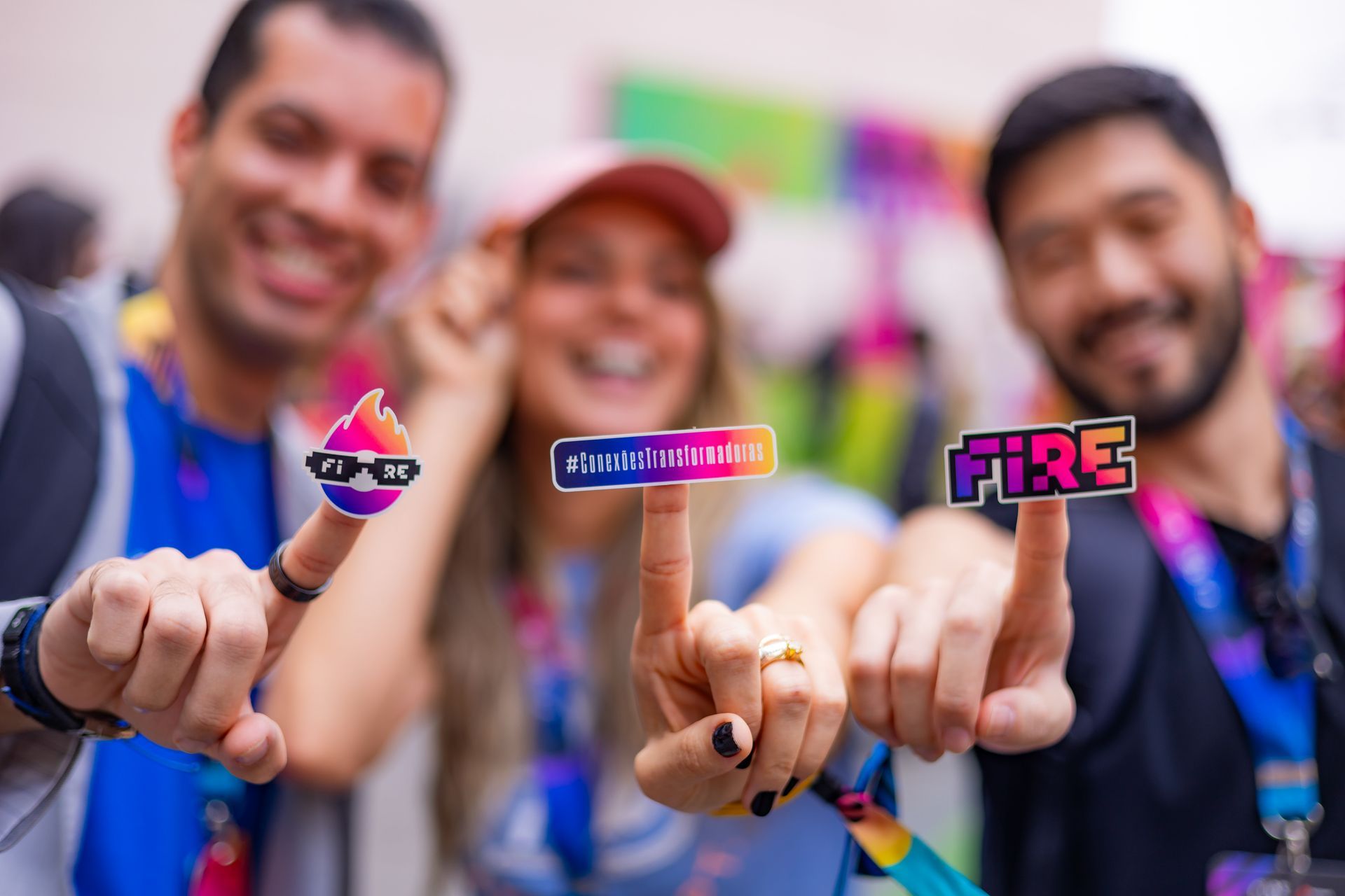 A group of people are holding up stickers on their fingers.
