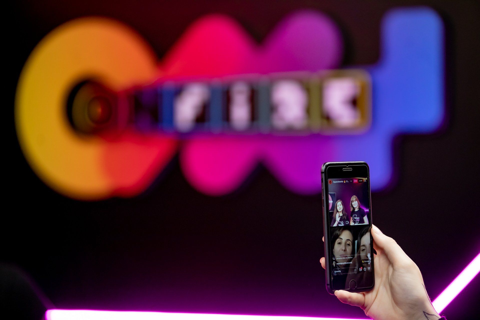 A person is taking a picture with a cell phone