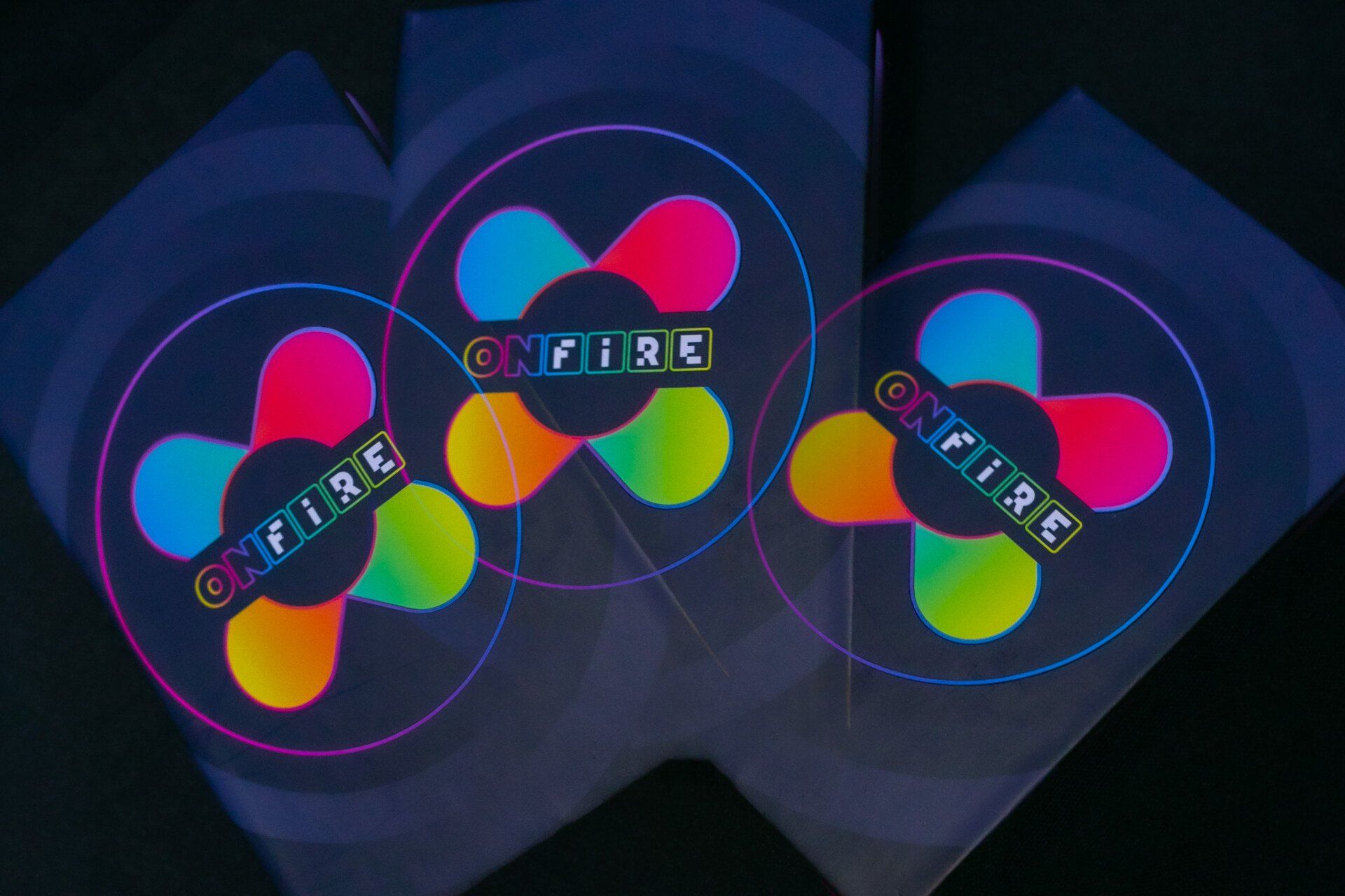Three circles with the word oxfire on them
