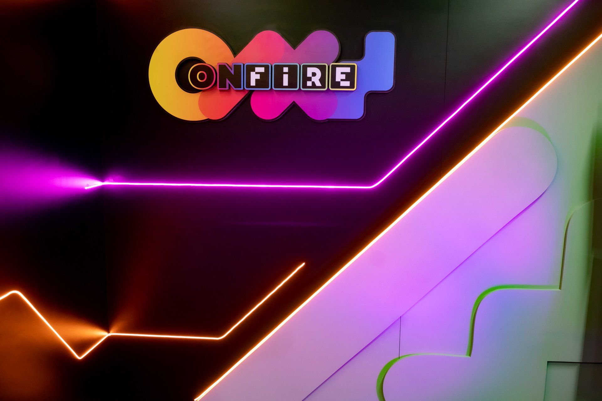 A neon sign with the word onfire on it