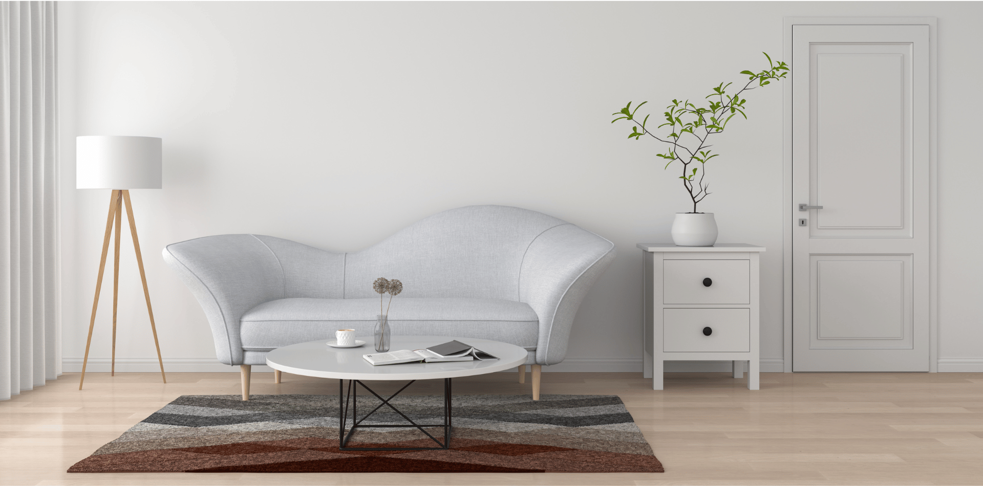 A living room with a couch , coffee table , lamp and rug.