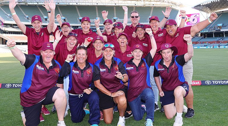  John Hammer and the cricket team celebrating on field