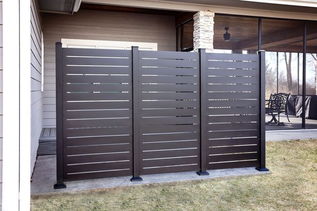 linear aluminum privacy panel for stylish backyard privacy.