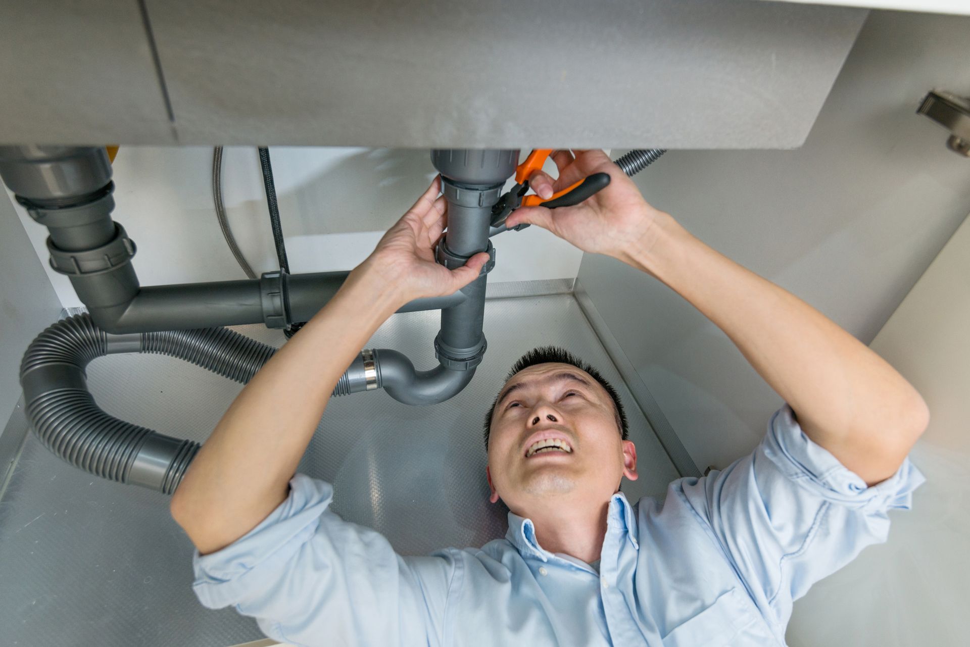 Plumber Unclogging a Tub Drain — Santa Margarita, CA — RSM Plumbing