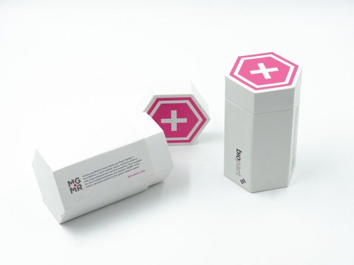 Three white medical cartons with pink hexagon cross logos on a white background