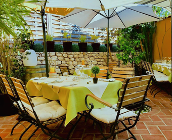 Terrace of Artistas Restaurant in Lagos, Algarve, with a relaxed and elegant atmosphere