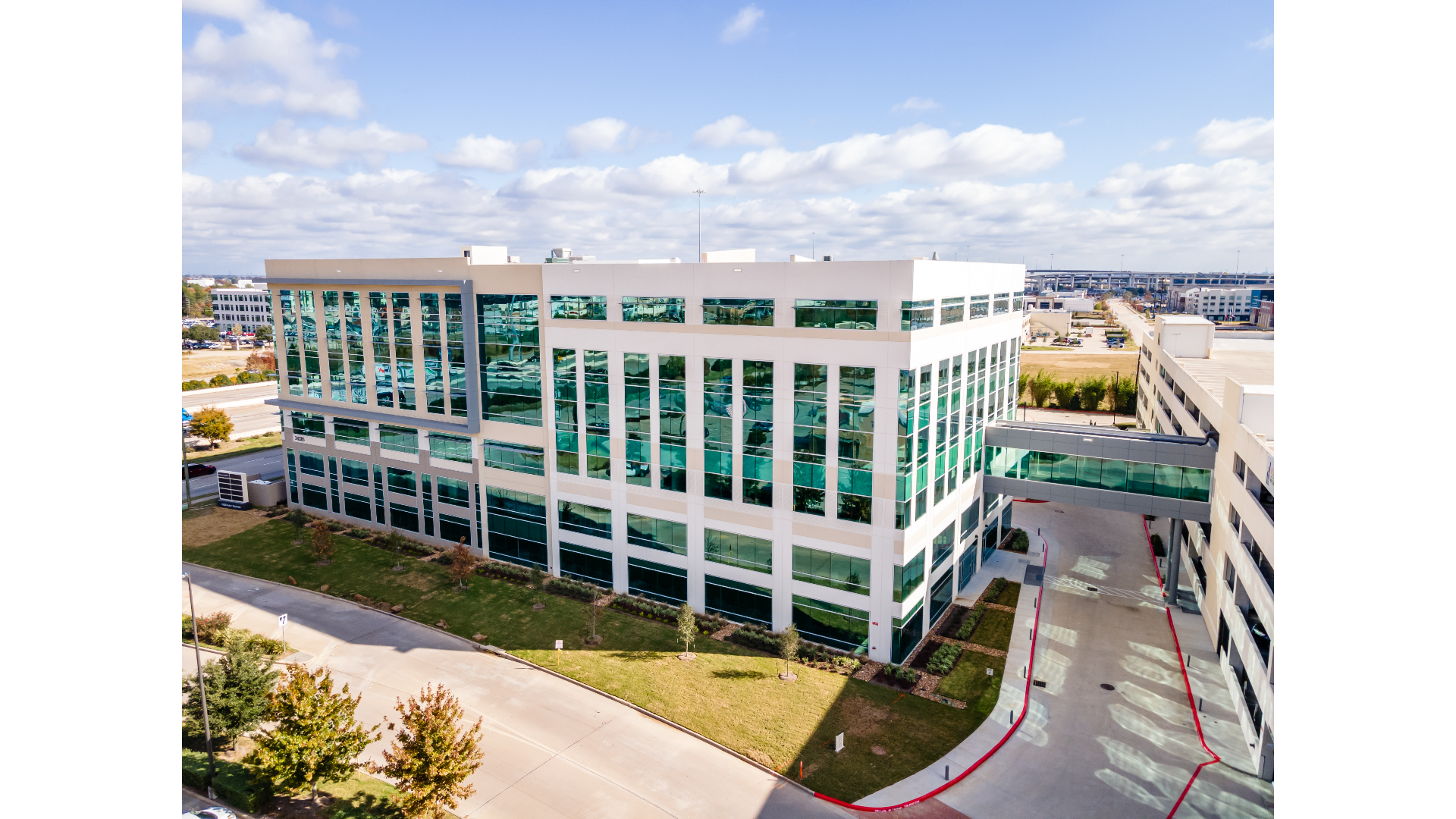An aerial view of a large building with a lot of windows.