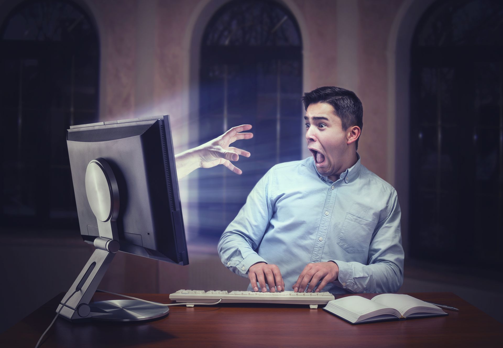 A hand coming out of the computer, scaring the viewer