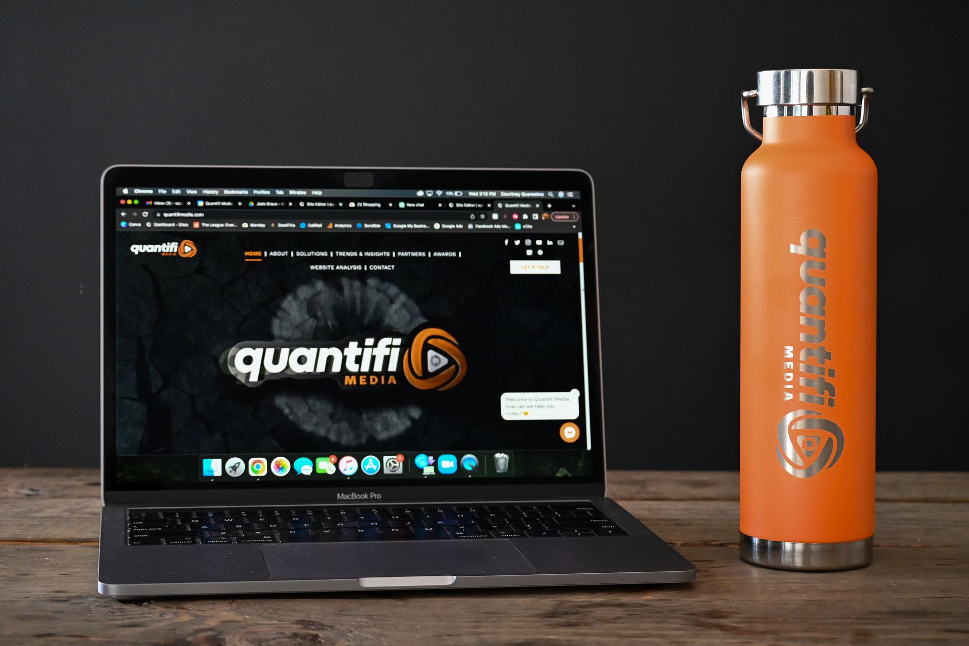 A laptop with the word quantifi on the screen