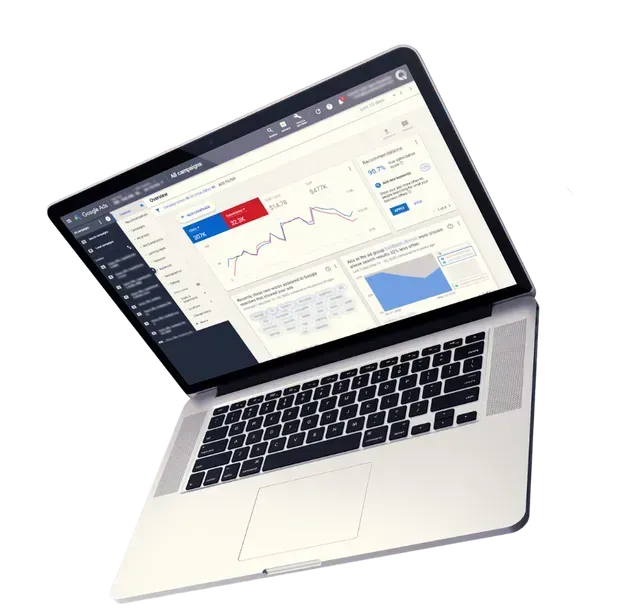 Silver laptop displaying a financial dashboard with charts and graphs on a white background