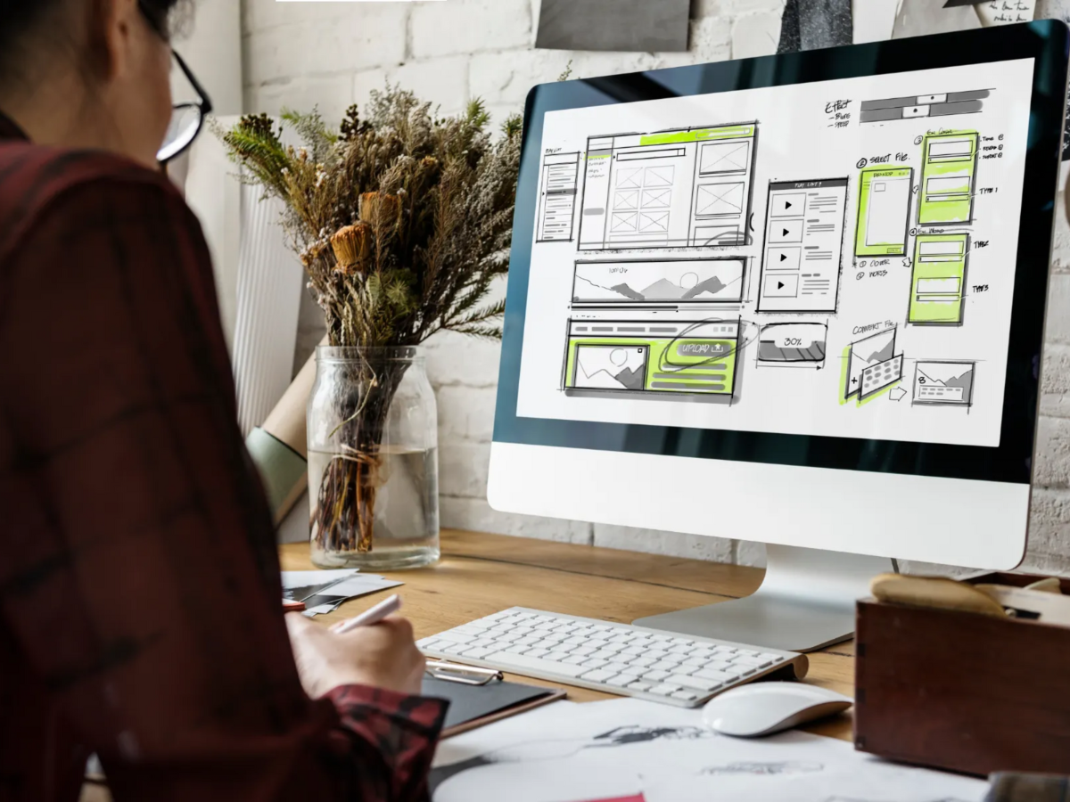 A woman formatting a website A woman formatting a website