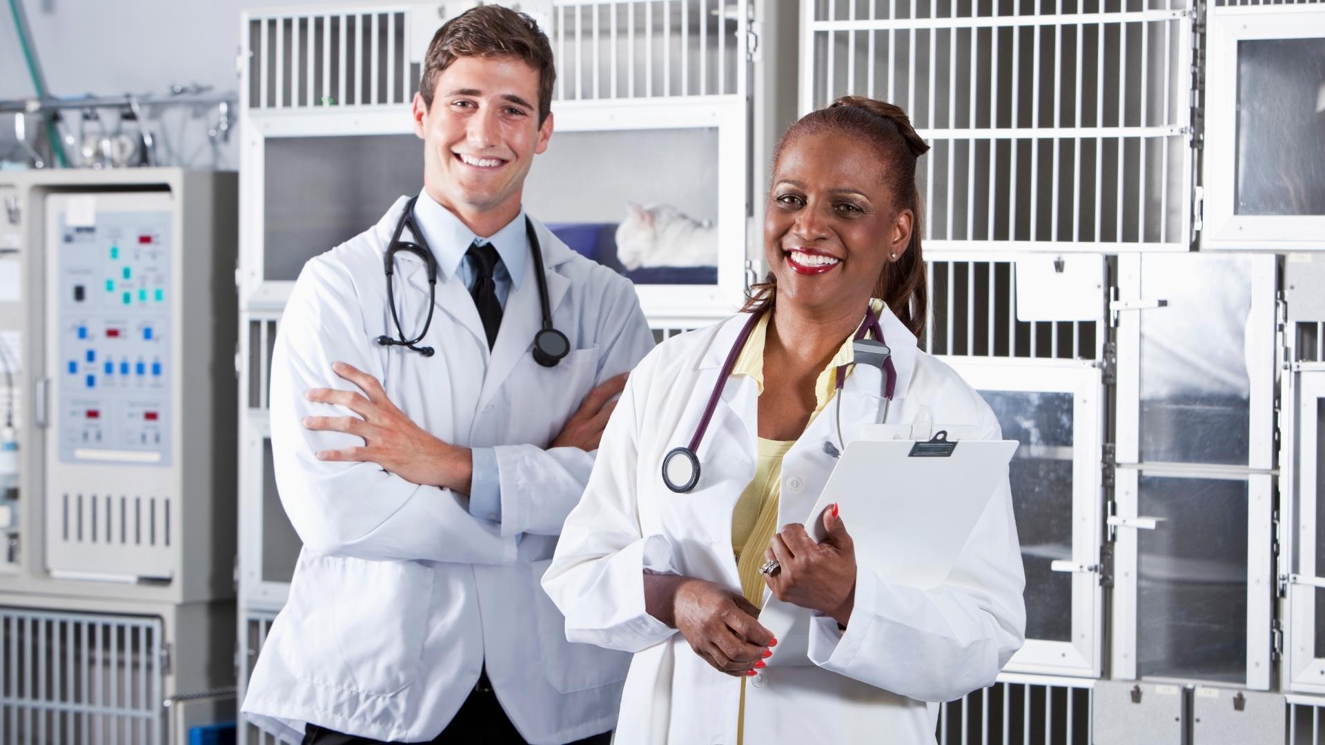 A man and a woman are standing next to each other in a room.
