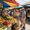 Busy outdoor market stall with colorful fruits and shoppers under umbrellas