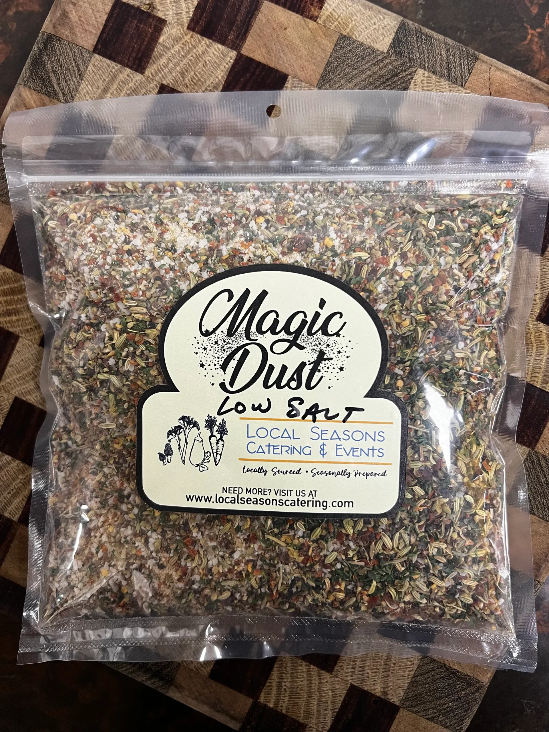 Bag of Magic Dust Low Salt seasoning blend in clear plastic packaging