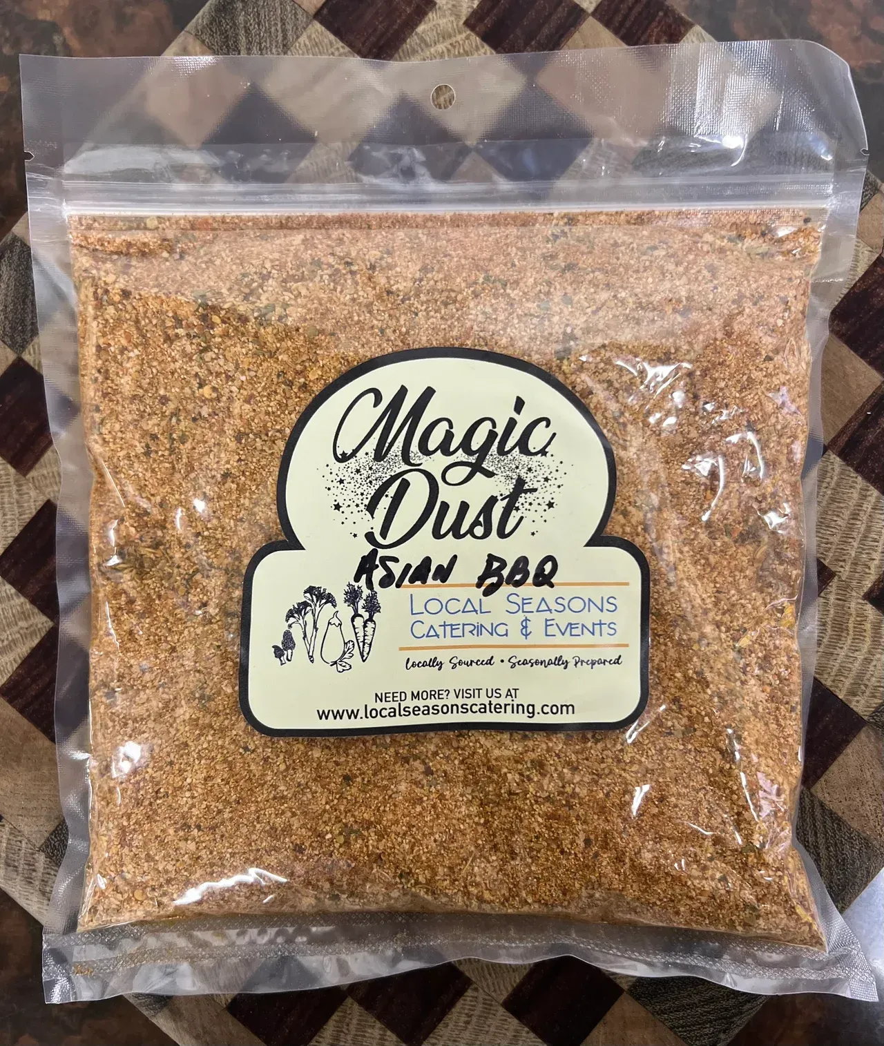 Bag of Magic Dust granulated BBQ seasoning on a countertop