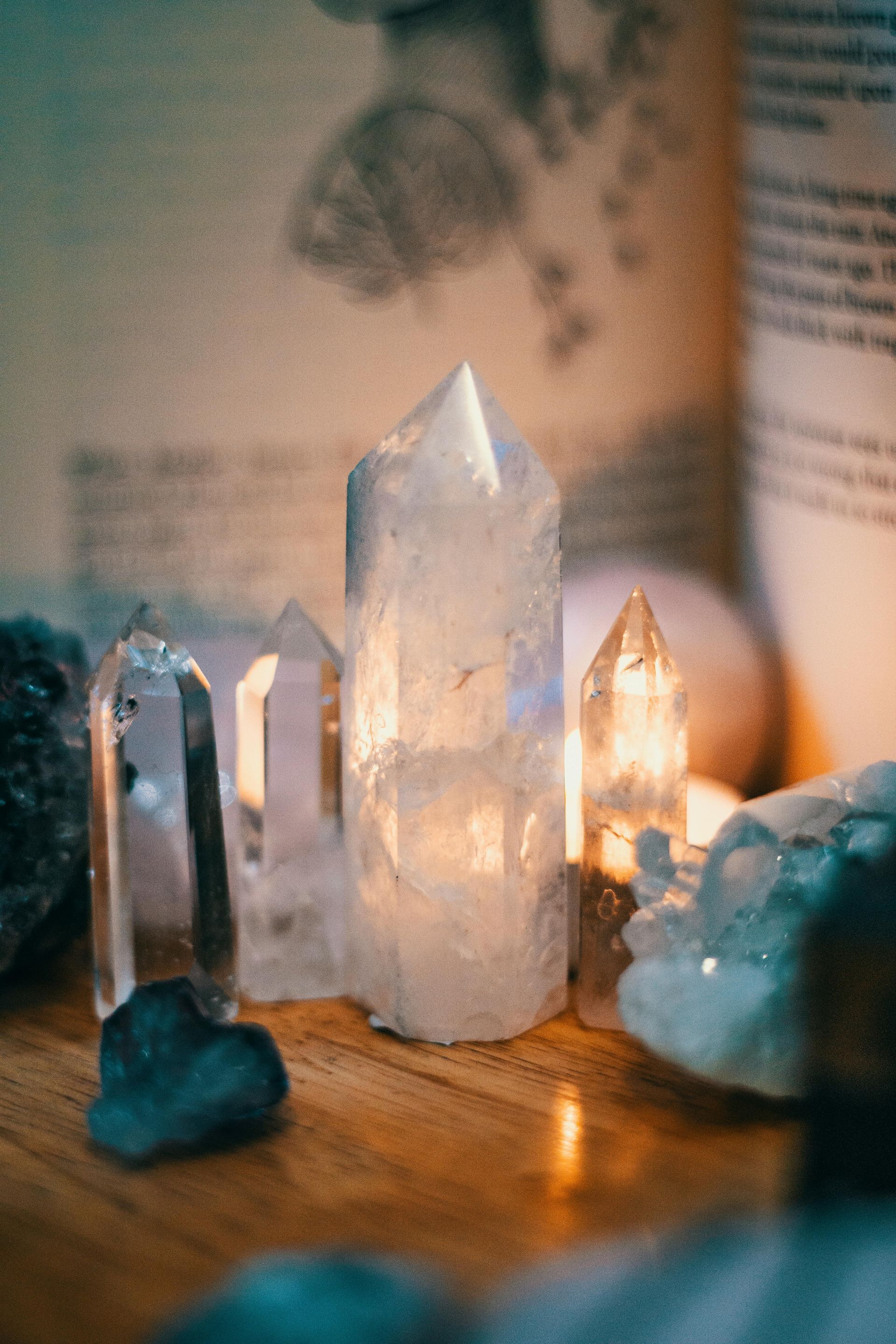 A group of crystals sitting on top of a wooden table.