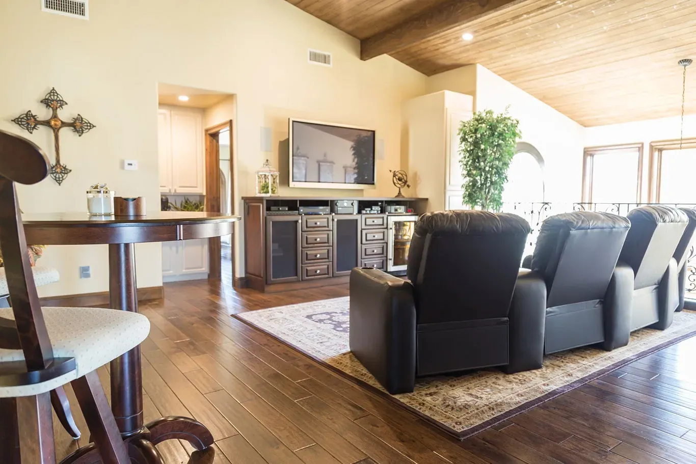 A living room filled with furniture and a flat screen tv.