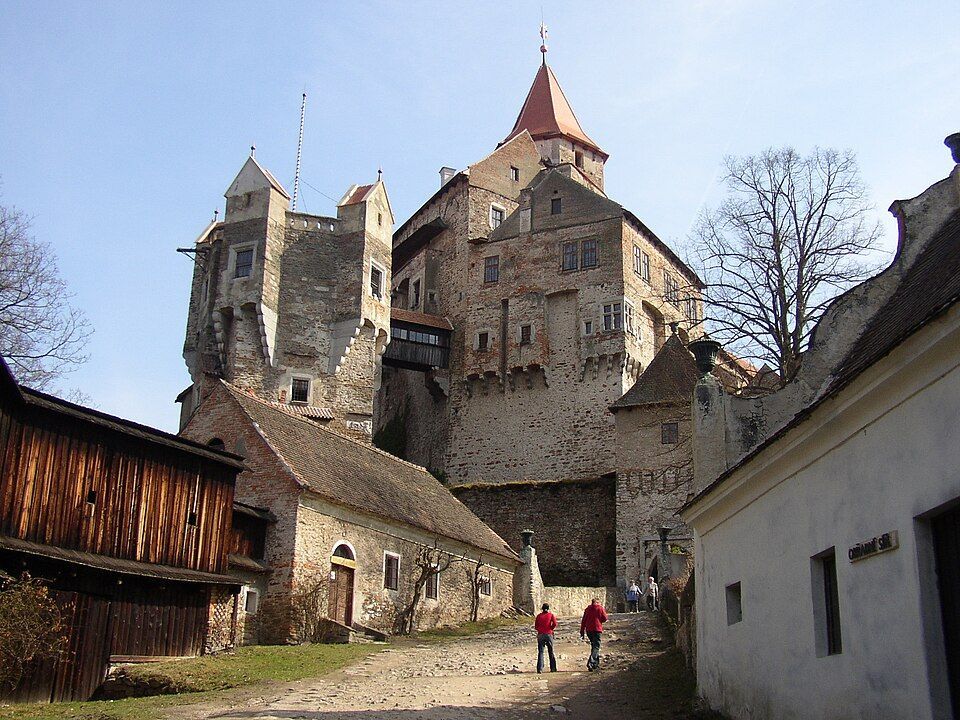 Pernštejn Castle rising on a rocky forest outcrop in Moravia, Czech Republic, near Brno