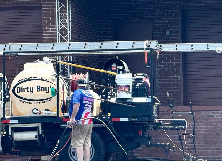 Dirty Boys crew doing the pressure washing