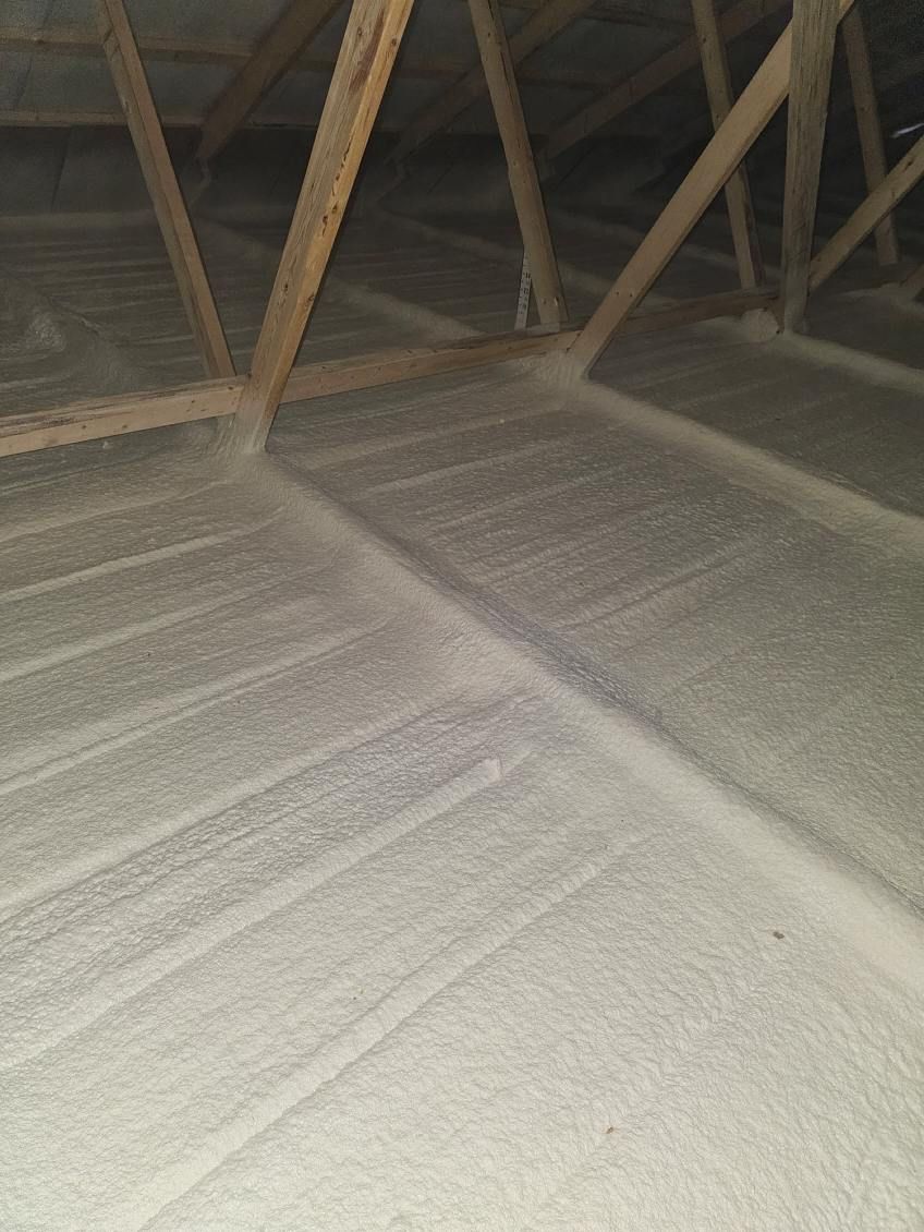 There is a lot of foam on the floor of the attic.
