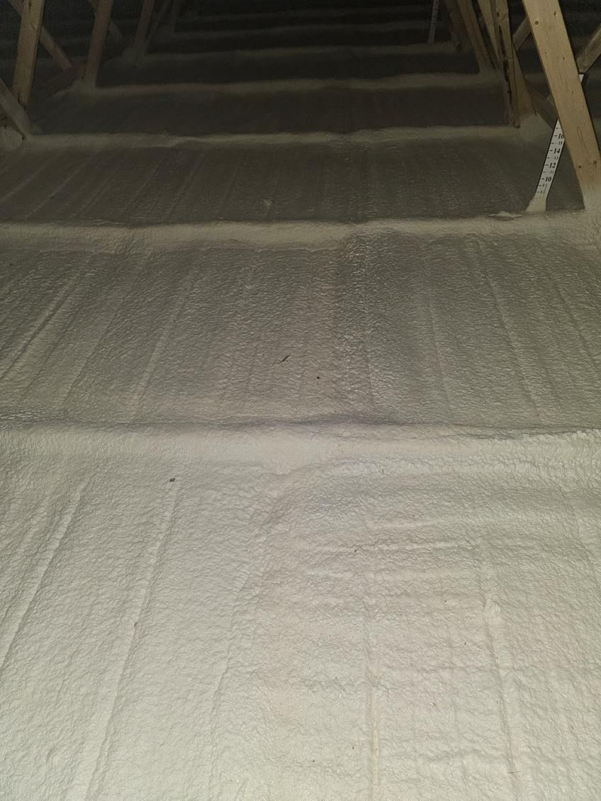 There is a lot of foam on the floor of the attic.