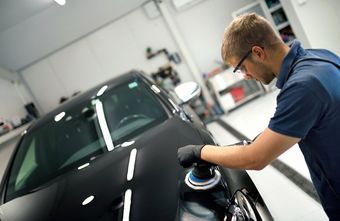 Man Doing Paint Correction — Plymouth, MN — Sheen Auto Spa LLC Man Doing Paint Correction — Plymouth, MN — Sheen Auto Spa LLC