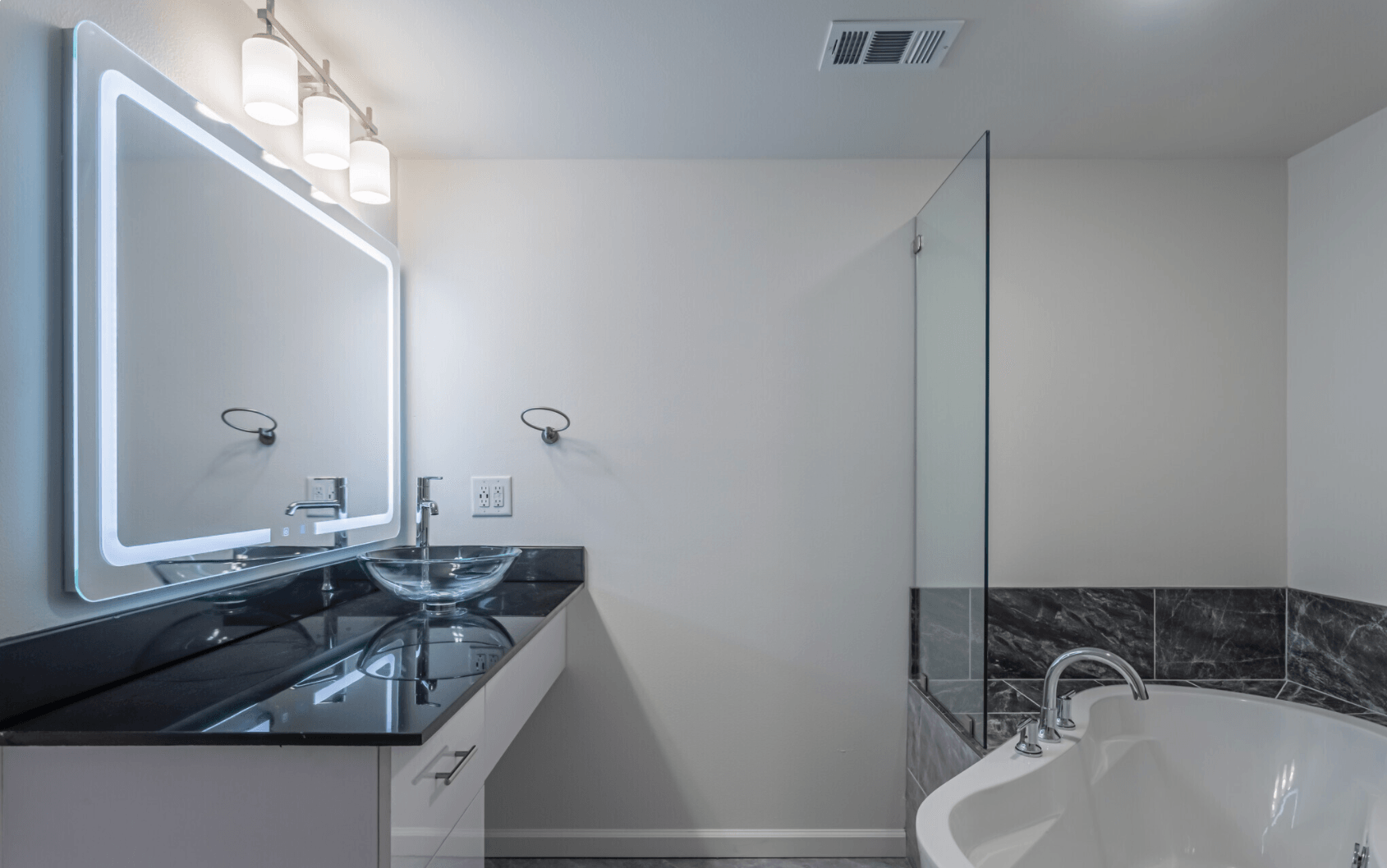 Interior of bathroom with light fixtures