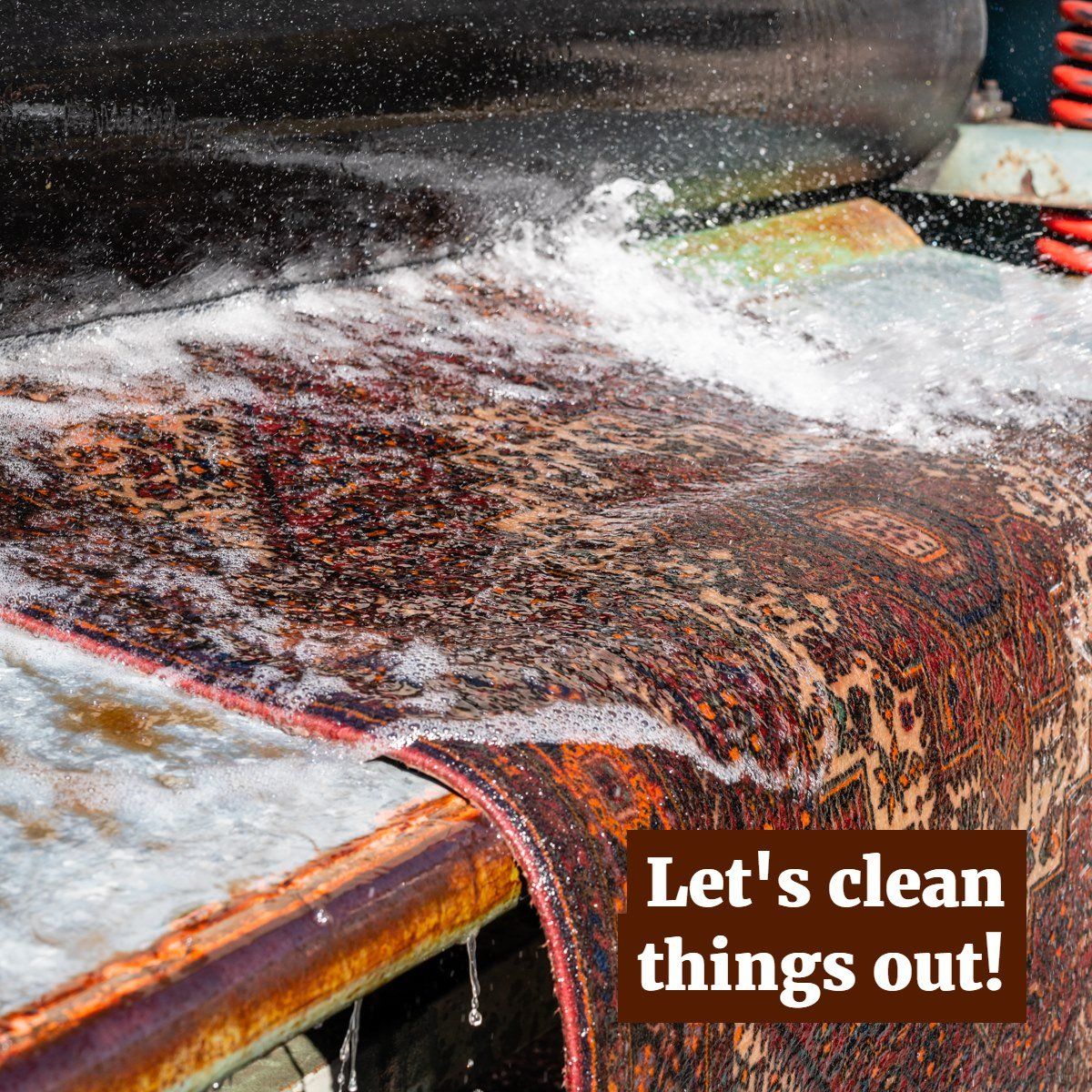 A machine washing a patterned oriental rug with soapy water and spray. Text overlay reads: 