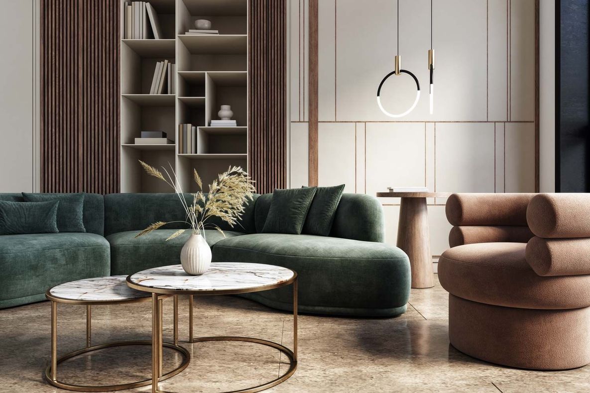 Modern living room with green curved sofa, round coffee tables, and tan lounge chair under wall art