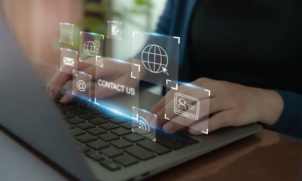 Image of a computer showing multiple ways of contacting us.