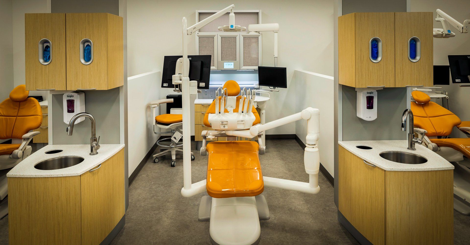 Interior of a Dental School There is a dental chair in the middle of the room.