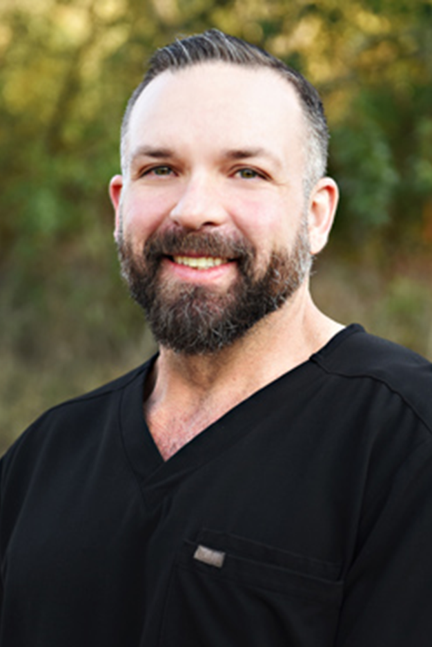 Dr. Andrea Fonner - Course Co-Director A woman with long blonde hair is smiling and wearing a black jacket.