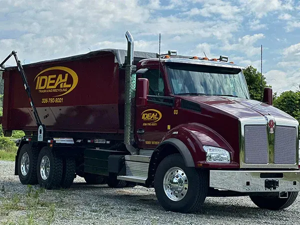 Maroon dump truck with