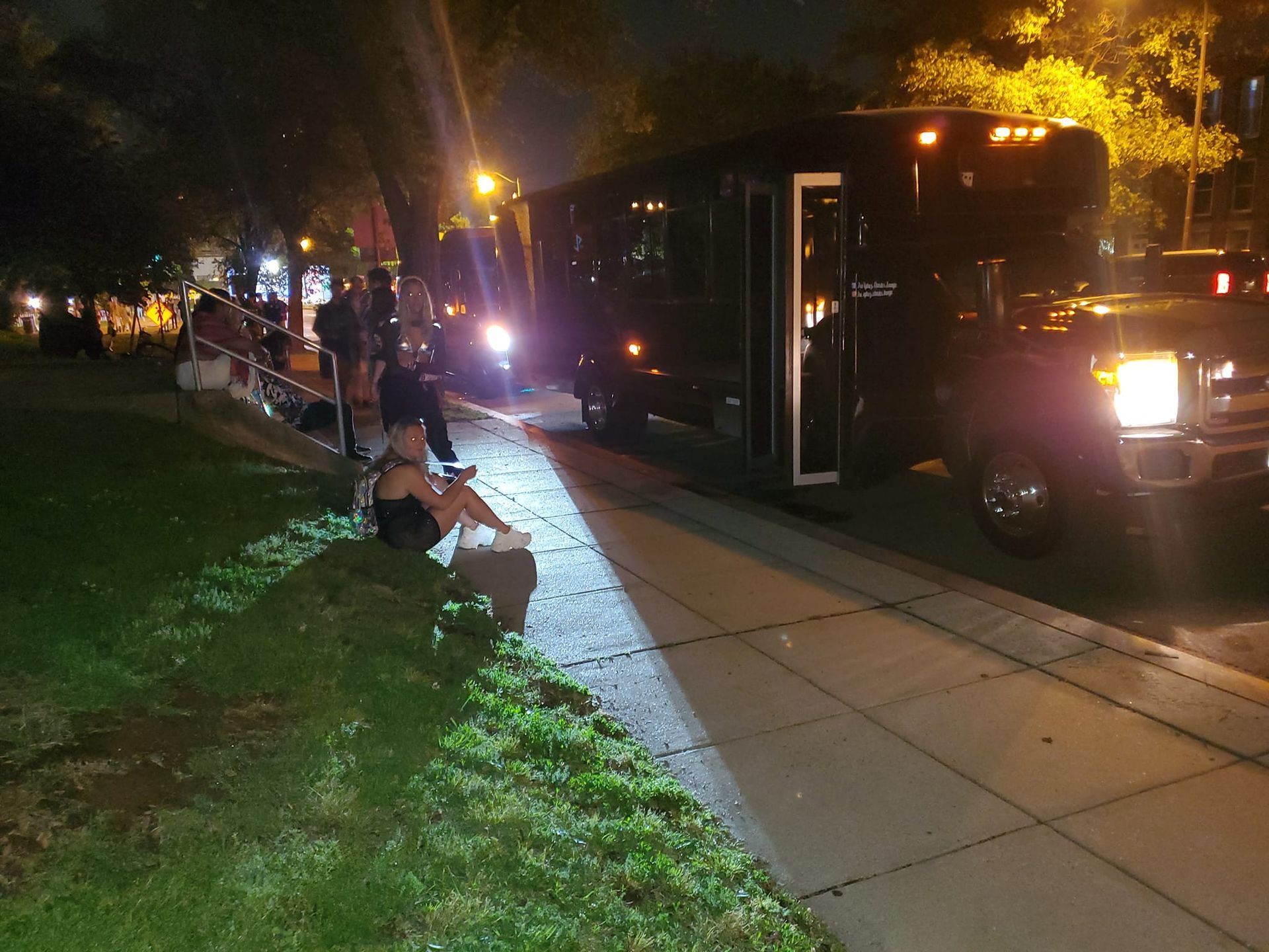 People Waiting Outside the Party Bus