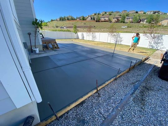 Backyard concrete patio extension