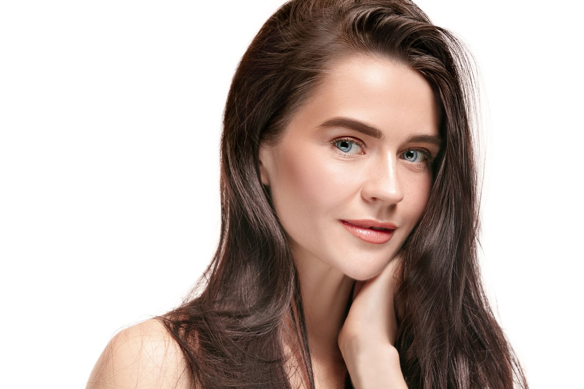woman with glowing skin smiling