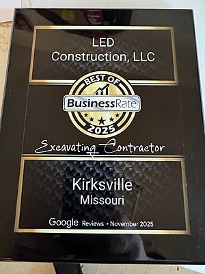 Award plaque for LED Construction, LLC, featuring a 2025 BusinessRate Best of badge in Kirksville, Missouri.