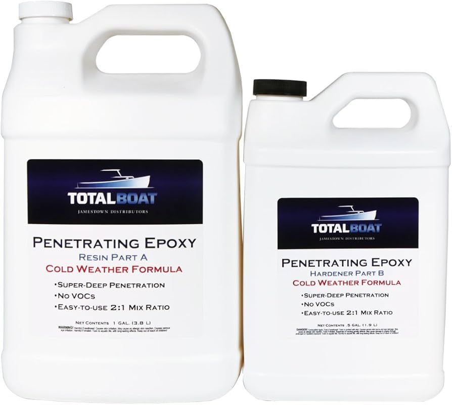 Two bottles of total boat penetrating epoxy resin part a cold weather formula