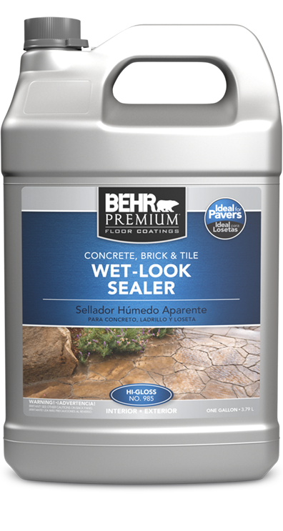 A bottle of behr premium wet look sealer for concrete , rock and tile.