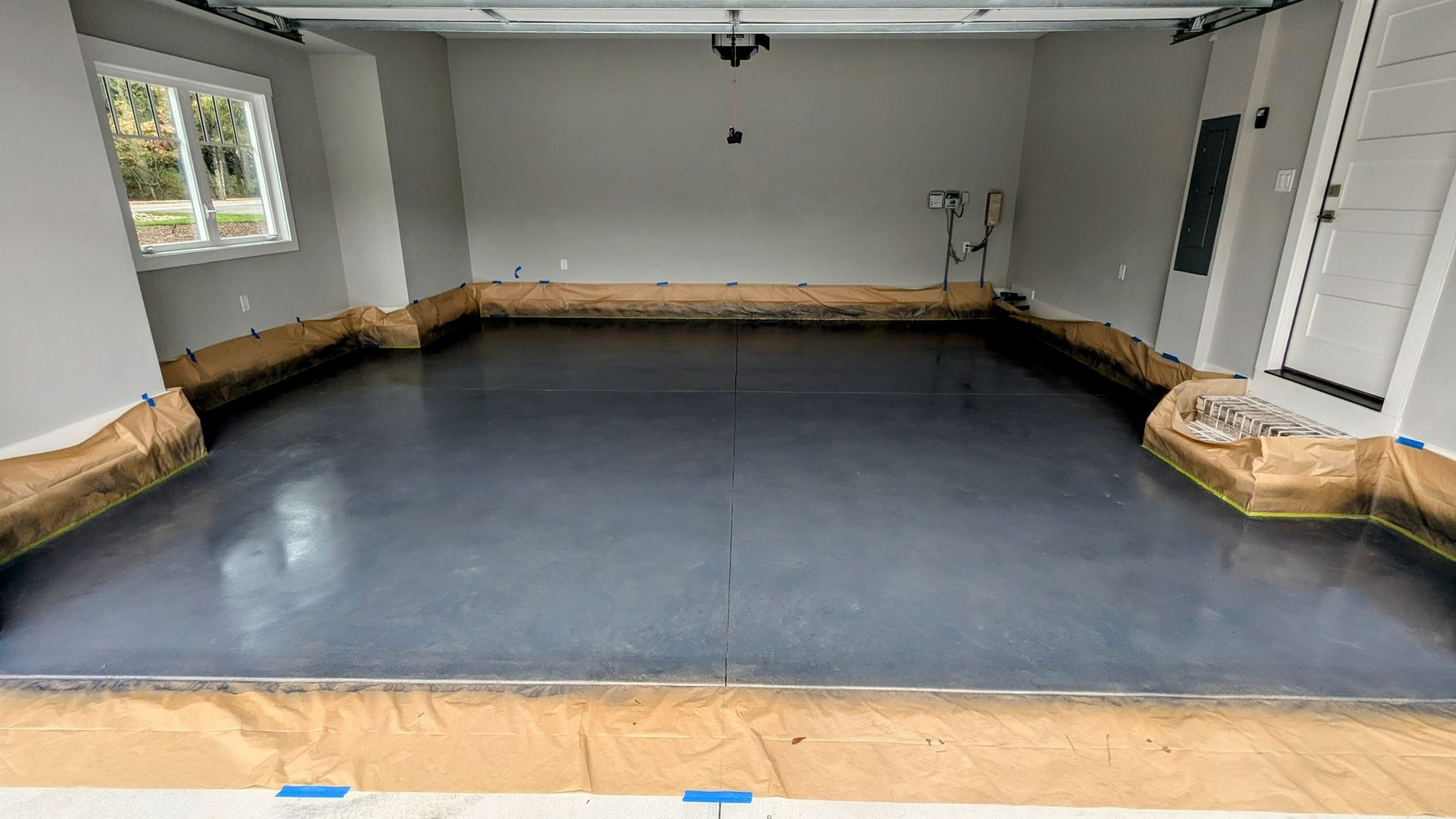 A residential floor with concrete coating application