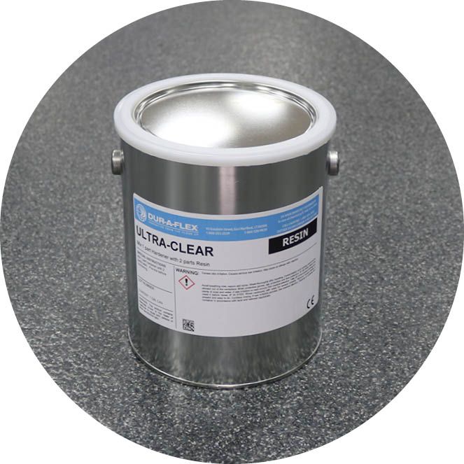 A can of ultra clear resin is sitting on a gray surface.