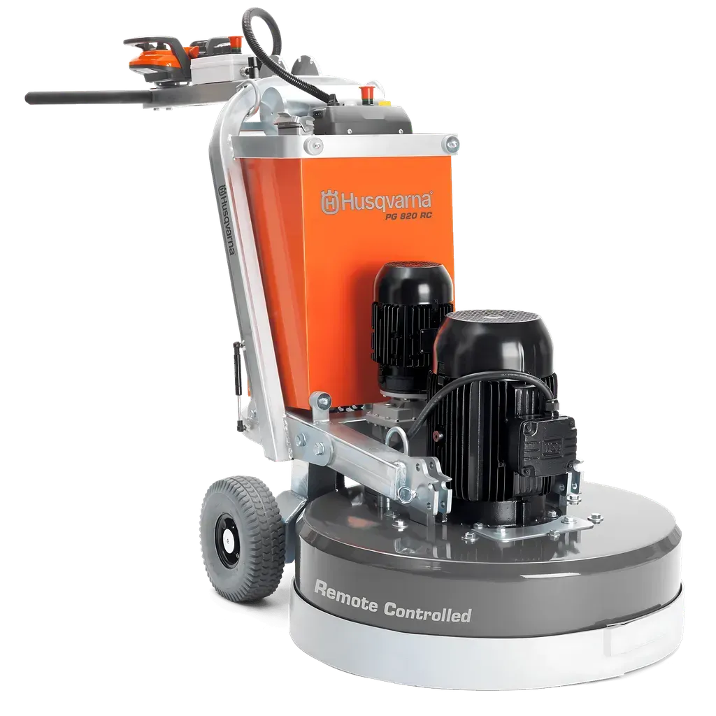 A husqvarna grinder is sitting on a white surface.