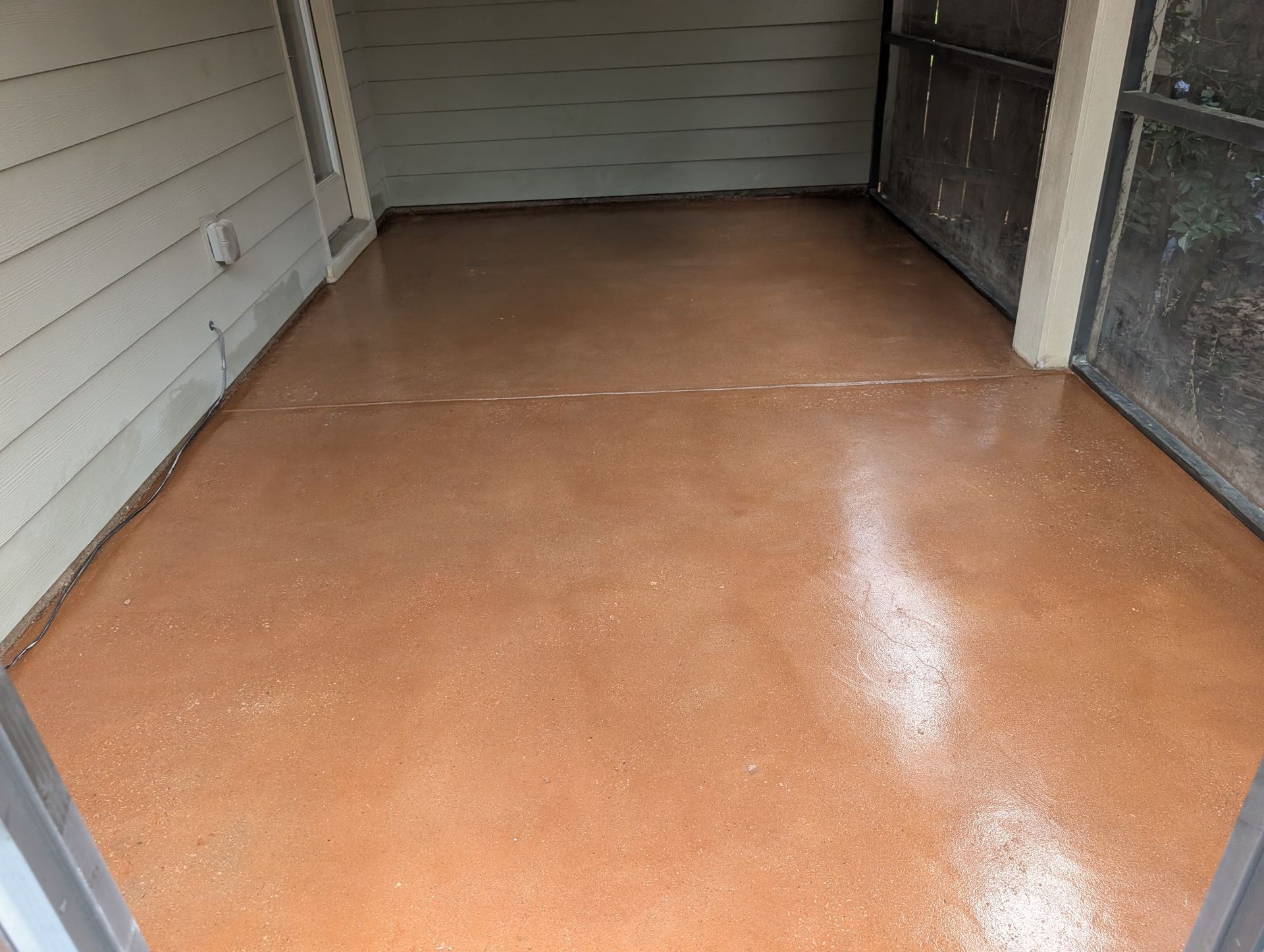 Dark Adobe Stained Concrete Porch in Greenville, SC