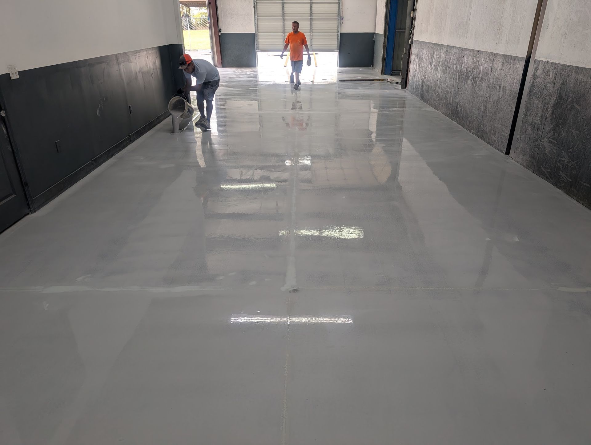 Zachary Daniel Concrete installed black metallic epoxy flooring for a garage in Concord, North Carolina.