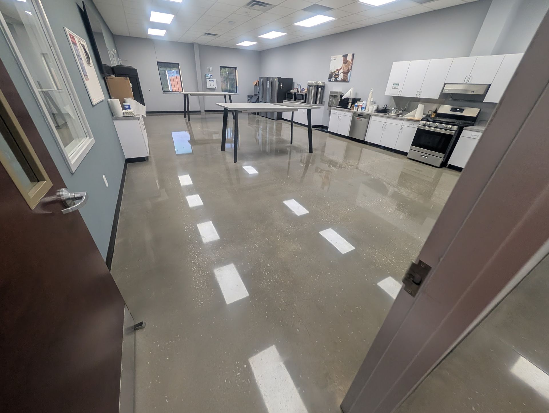 Zachary Daniel Concrete applied light blue epoxy flooring in a warehouse in Rock Hill, South Carolina.