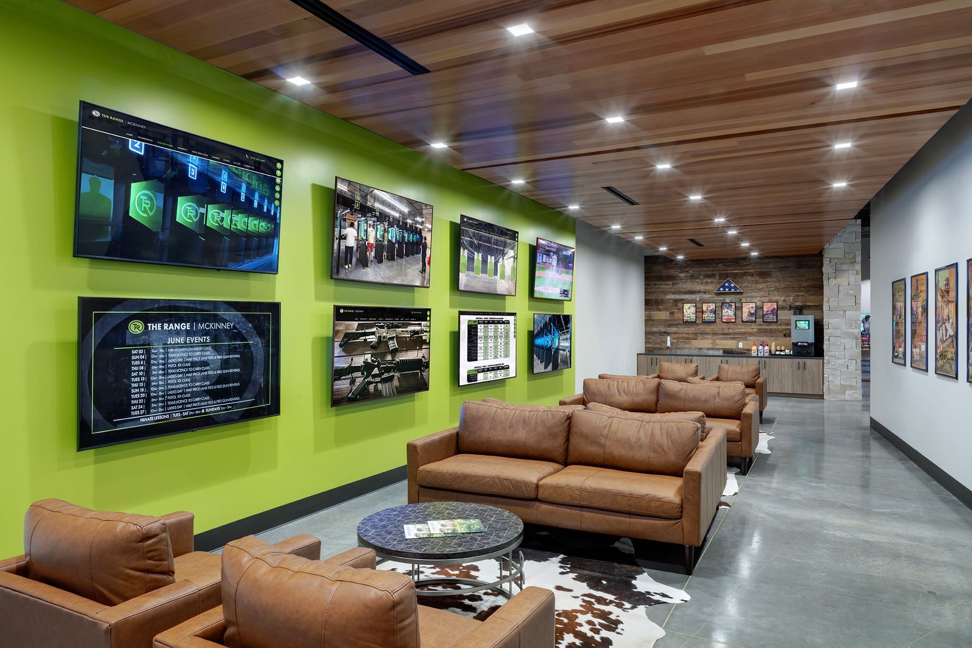 Lounge with leather couches and firearm wall displays