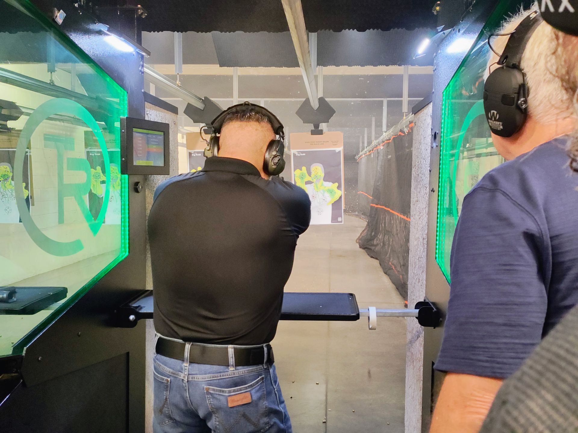 Guests shooting at green-lit lanes