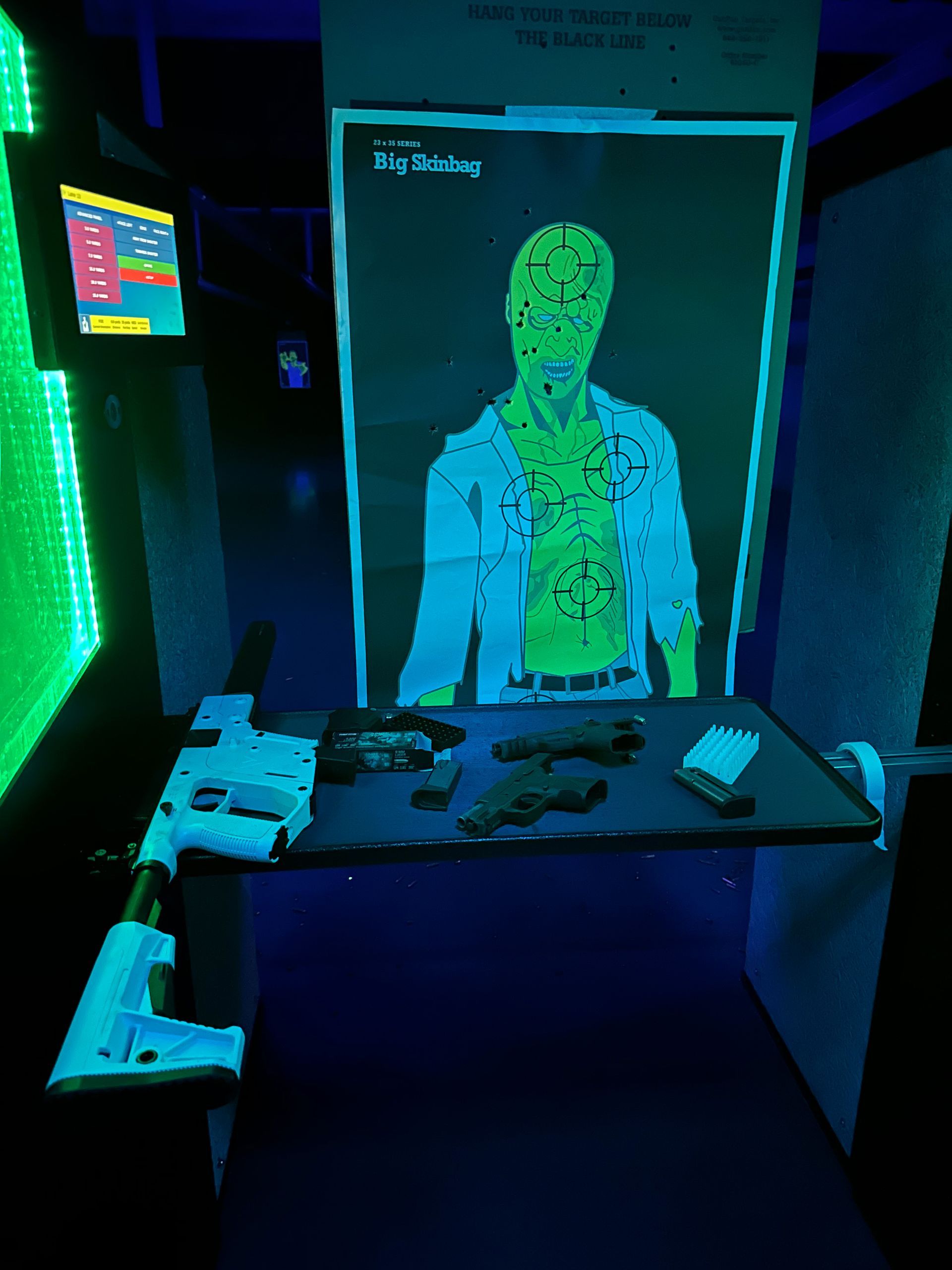 300-degree simulator showing a green silhouette target